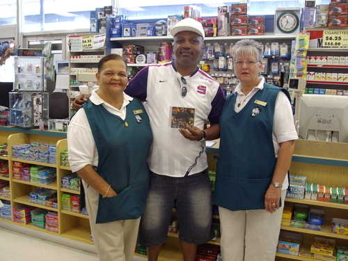 Clinark with the Mrs Outerbridge and fellow staff Collectors Hill Pharmacy